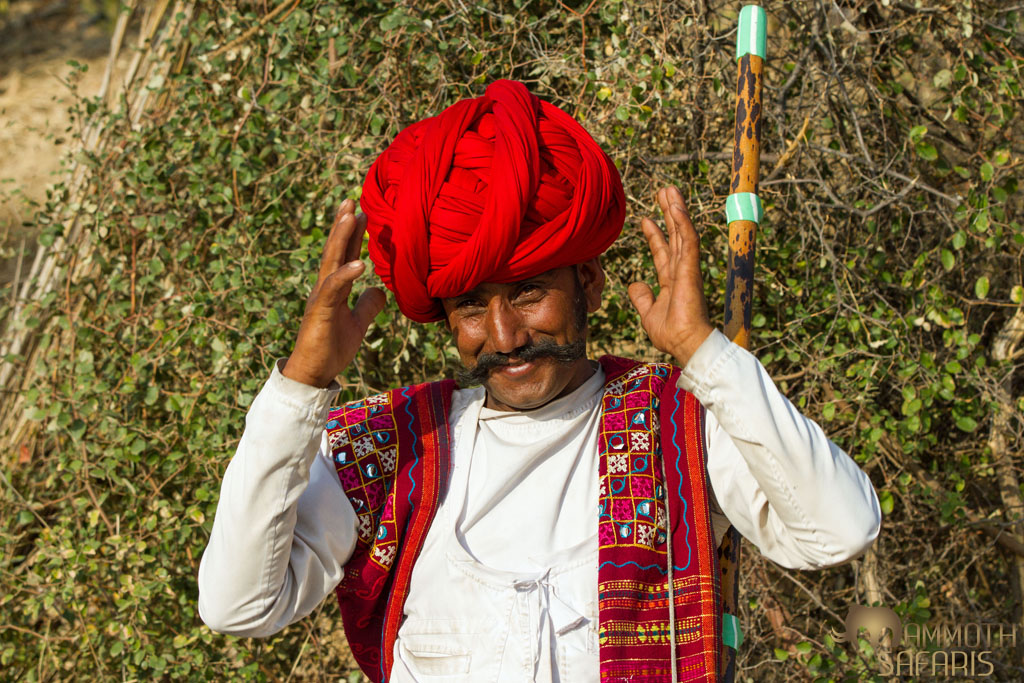 The traditional dress of the semi-nomadic Rabari herdsman is both vibrant and stately. The wry smile on this man’s face is due to our fascination as we watched him wrap his turban with mesmerizing speed and precision.